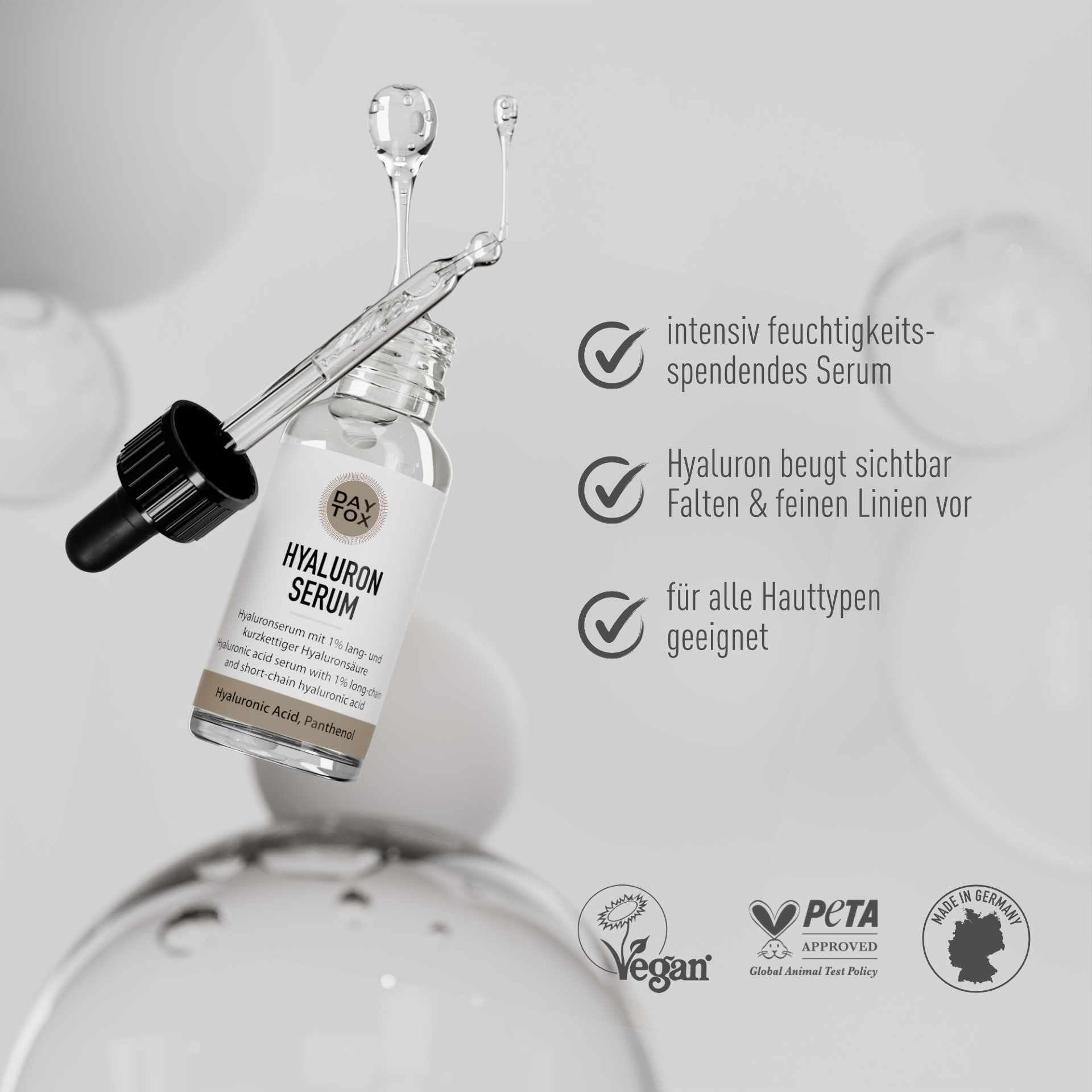 Daytox Hyaluron Serum Flasche mit Pipette und drei Vorteils-Texten. Logos für Vegan, PETA und Made in Germany.
